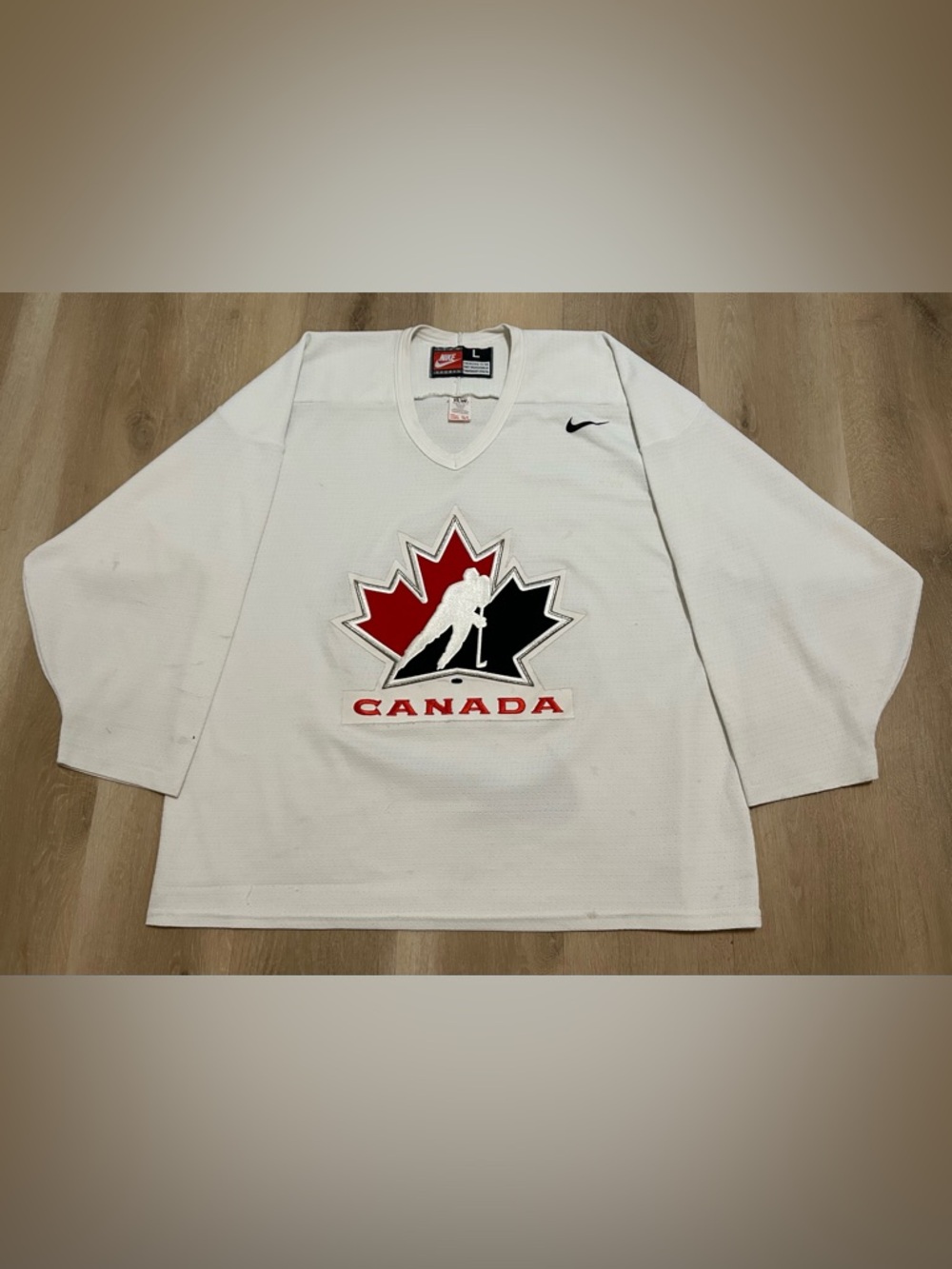 Nike White Hockey Jersey with Red & Black Maple Logo